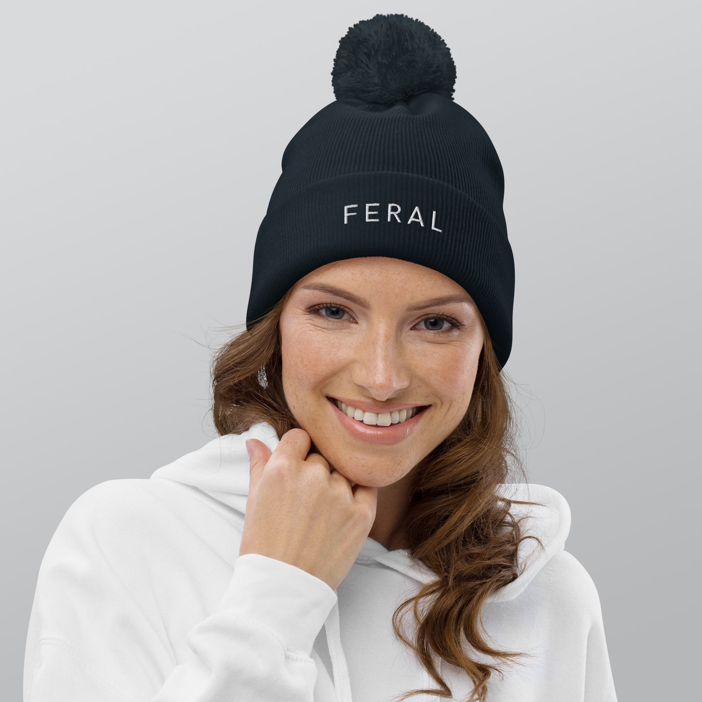 Feral Pom pom beanie