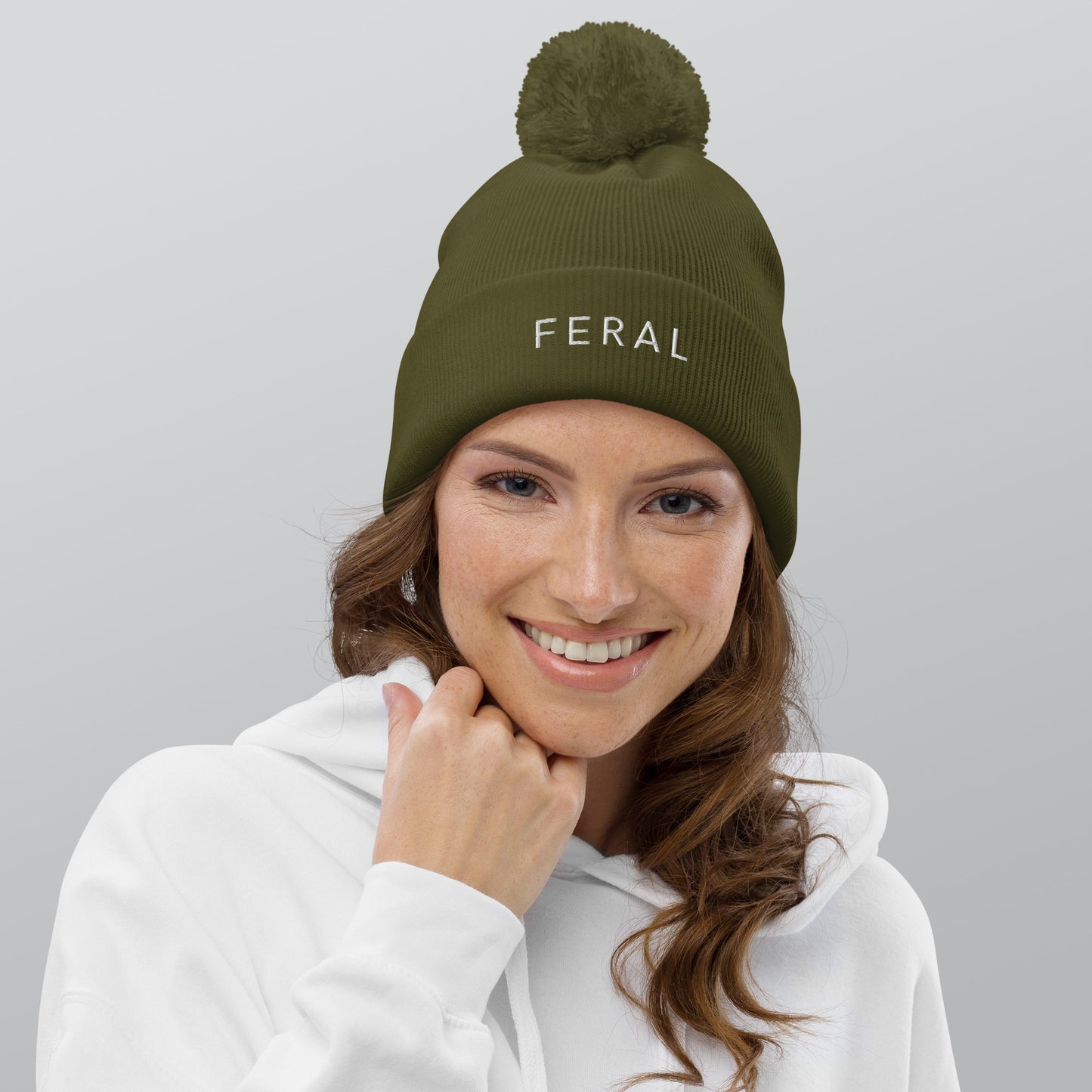 Feral Pom pom beanie